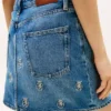 Allover Crest High-Rise Denim Mini Skirt Allover Crest High-Rise Denim Mini Skirt