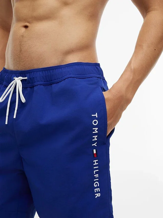 Tommy Logo 7″ Swim Trunk Tommy Logo 7″ Swim Trunk